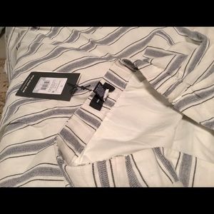 Who What Wear size 16 navy cream stripe skirt with a uniquely cut hem.